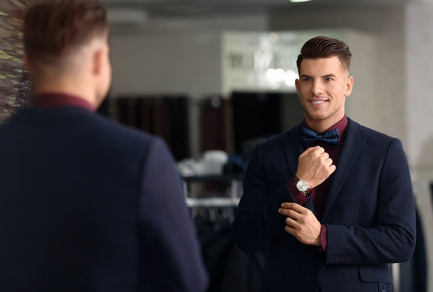 Title (4) Mindset is everything showing person seeing his watch and watching himself confidently